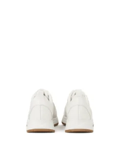 Białe sneakersy w monogramy z łączonych skór