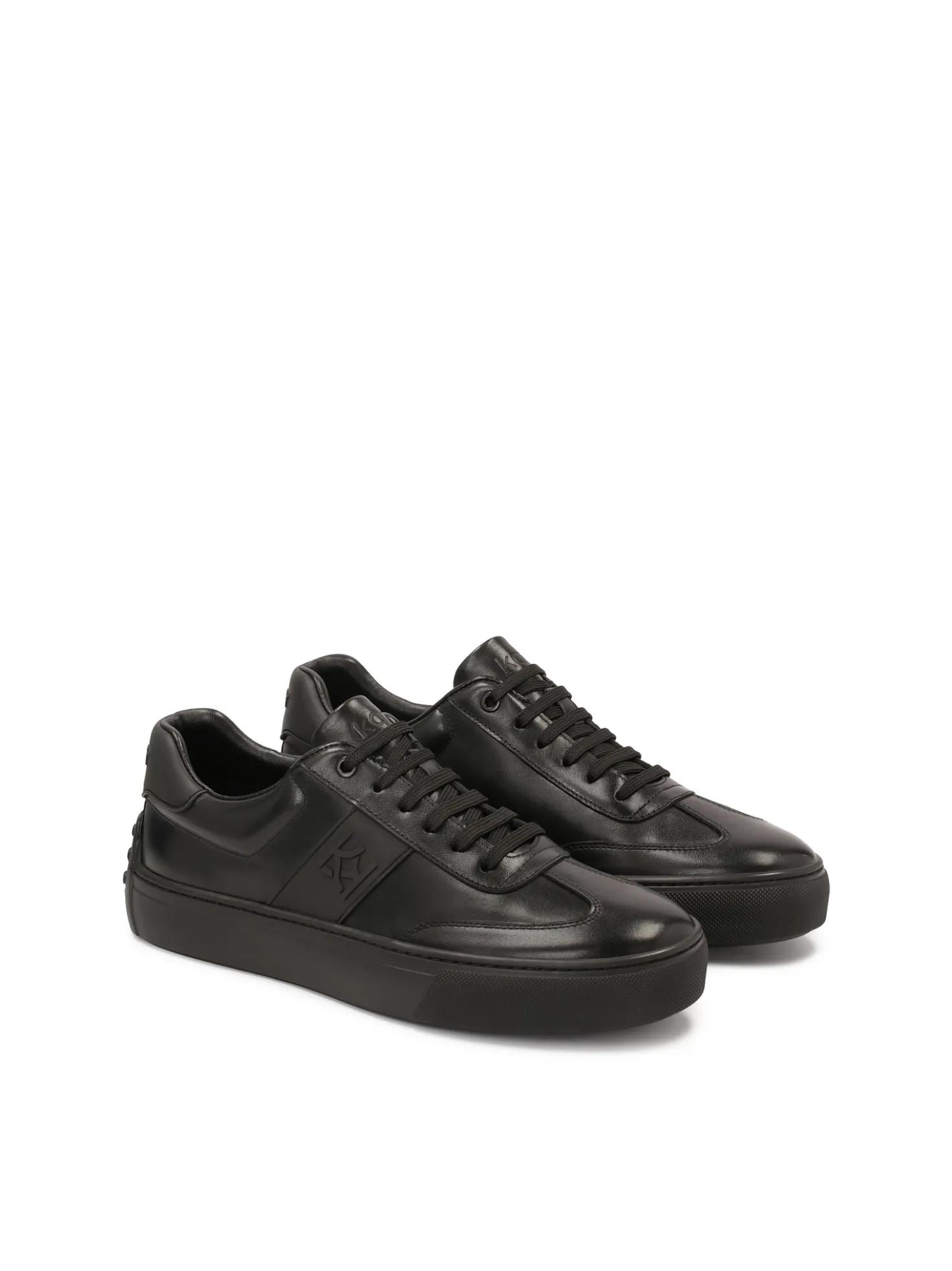 Czarne skórzane sneakersy z gumą na pięcie