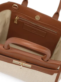 Trapezowa torebka z tkaniny i skóry